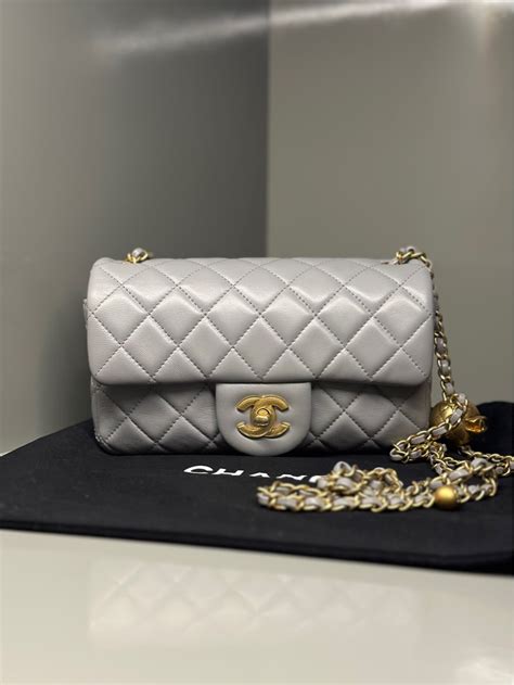 chanel mini with adjustable strap.